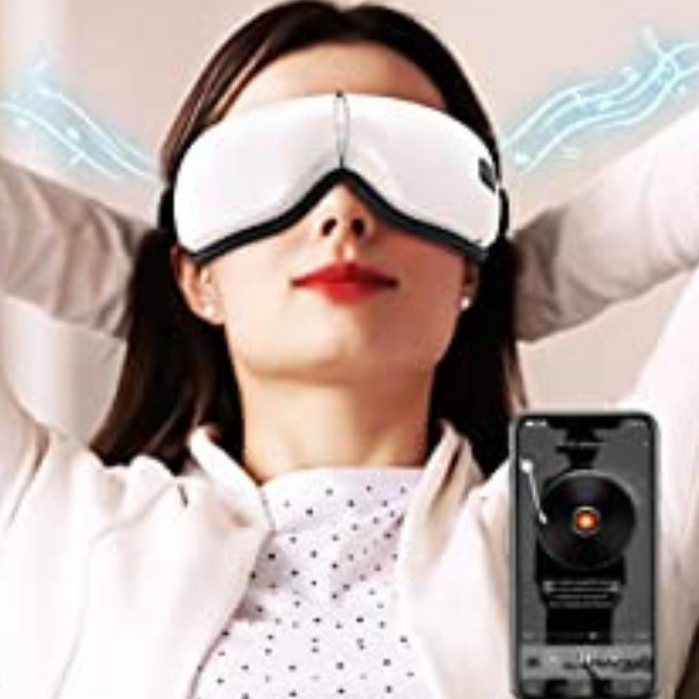 A padded heated eye massager mask with an adjustable strap